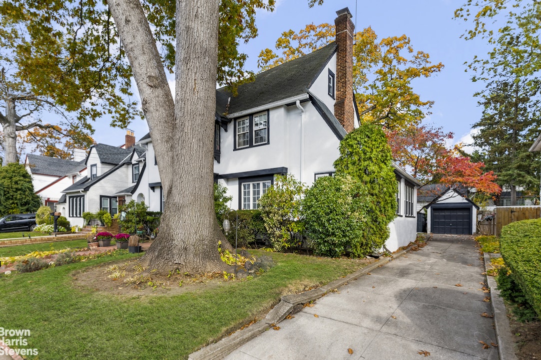 112-14 178th Street Queens, NY 11433 - Photo 2 of 24 a front view of a house with a yard