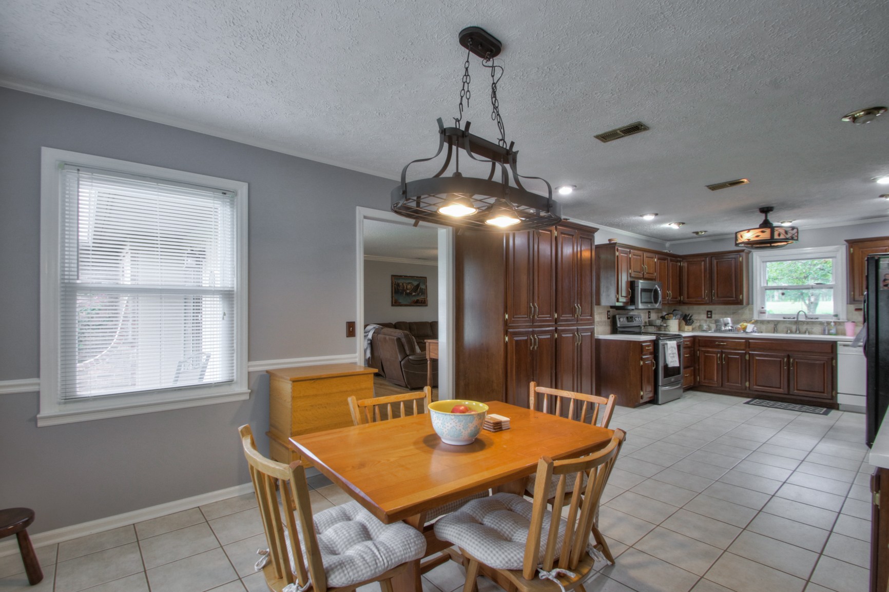 4737 McCrary Road Lebanon, TN 37090 - Photo 4 of 24 a view of a dining room with furniture and a chandelier