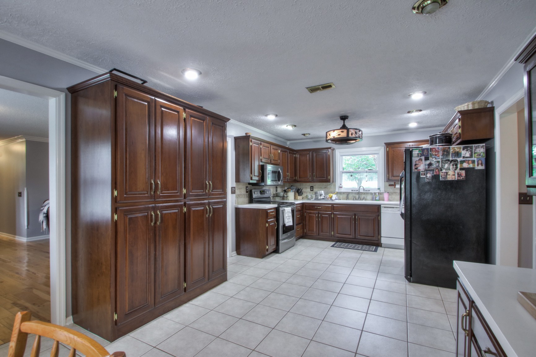 4737 McCrary Road Lebanon, TN 37090 - Photo 5 of 24 a kitchen with stainless steel appliances granite countertop a refrigerator and a sink