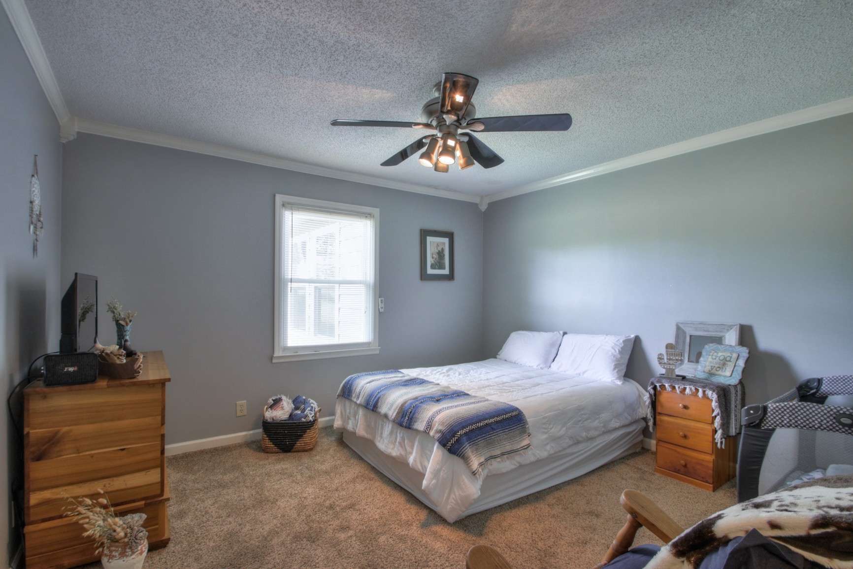 4737 McCrary Road Lebanon, TN 37090 - Photo 9 of 24 a bedroom with a bed and wooden floor