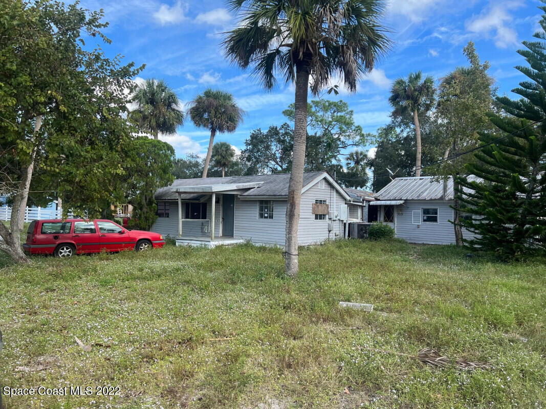 a house view with a garden space