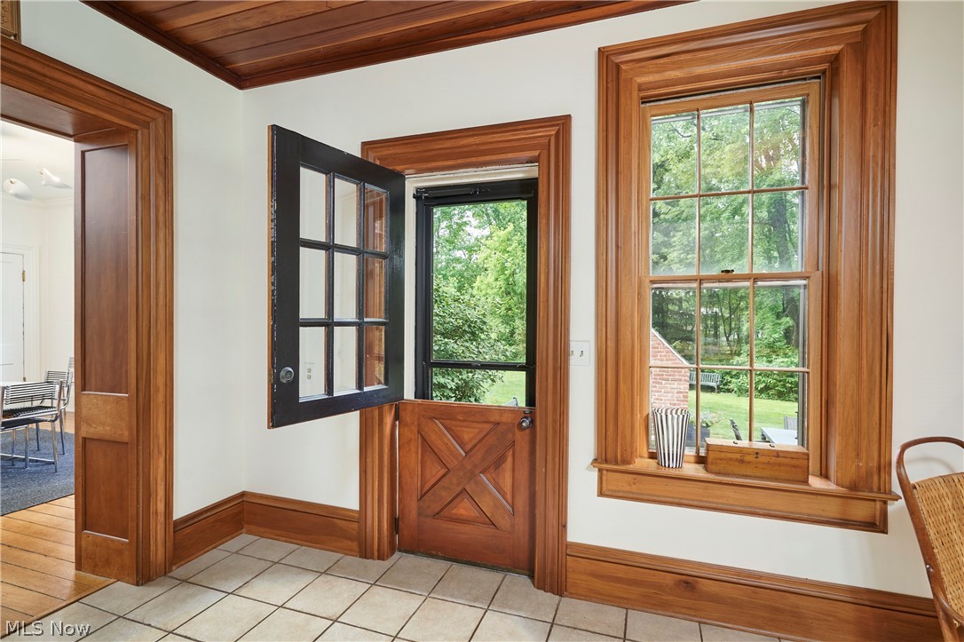 5046 Alger Road Richfield, OH 44286 - Photo 27 of 49 Dutch door with upper half open, featuring a grid of glass panes