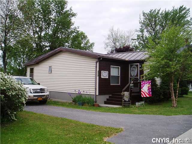 Exterior Front. Easy care vinyl siding and metal r