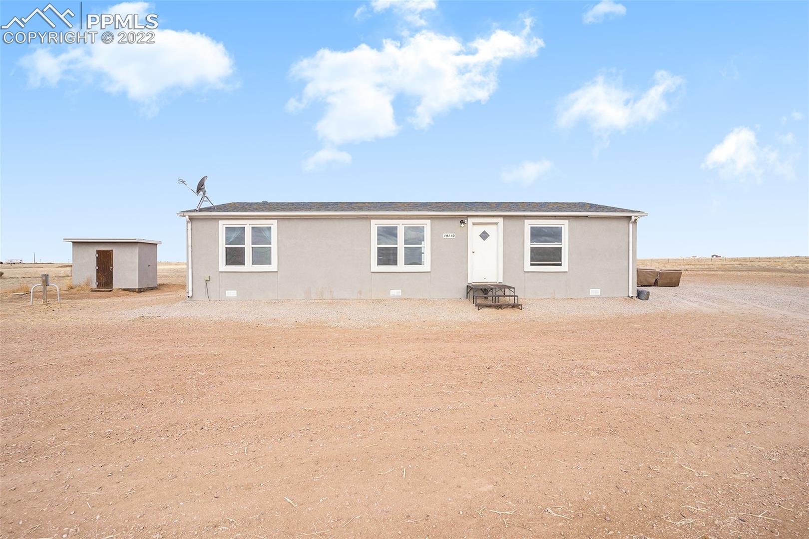 19110 Powers Road Colorado Springs, CO 80928 - Photo 1 of 17 Front