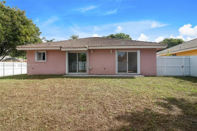 a house view with a garden space