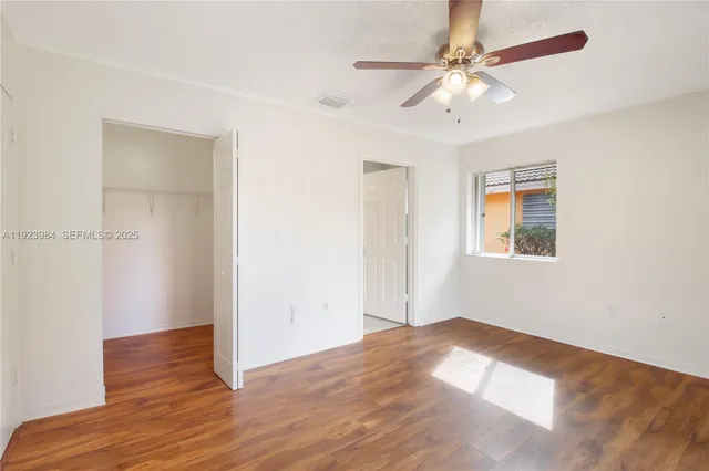 a bathroom with a bathtub and a toilet