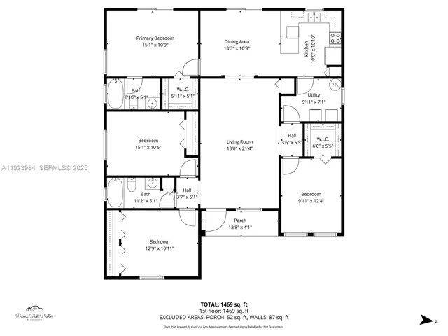 a house with tall trees in front of it