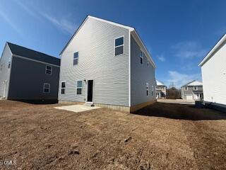 58 Stout Landing Dunn, NC 28334 - Photo 6 of 22 a front view of a house with a yard