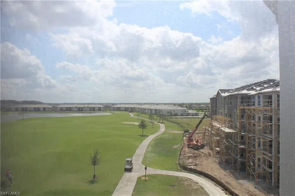 an aerial view of a golf course with a garden