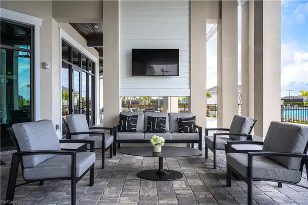 a view of a dining room with furniture window and outside view