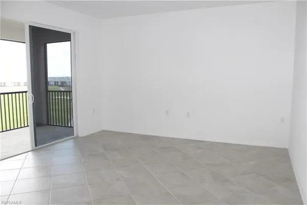 an empty room with sliding door
