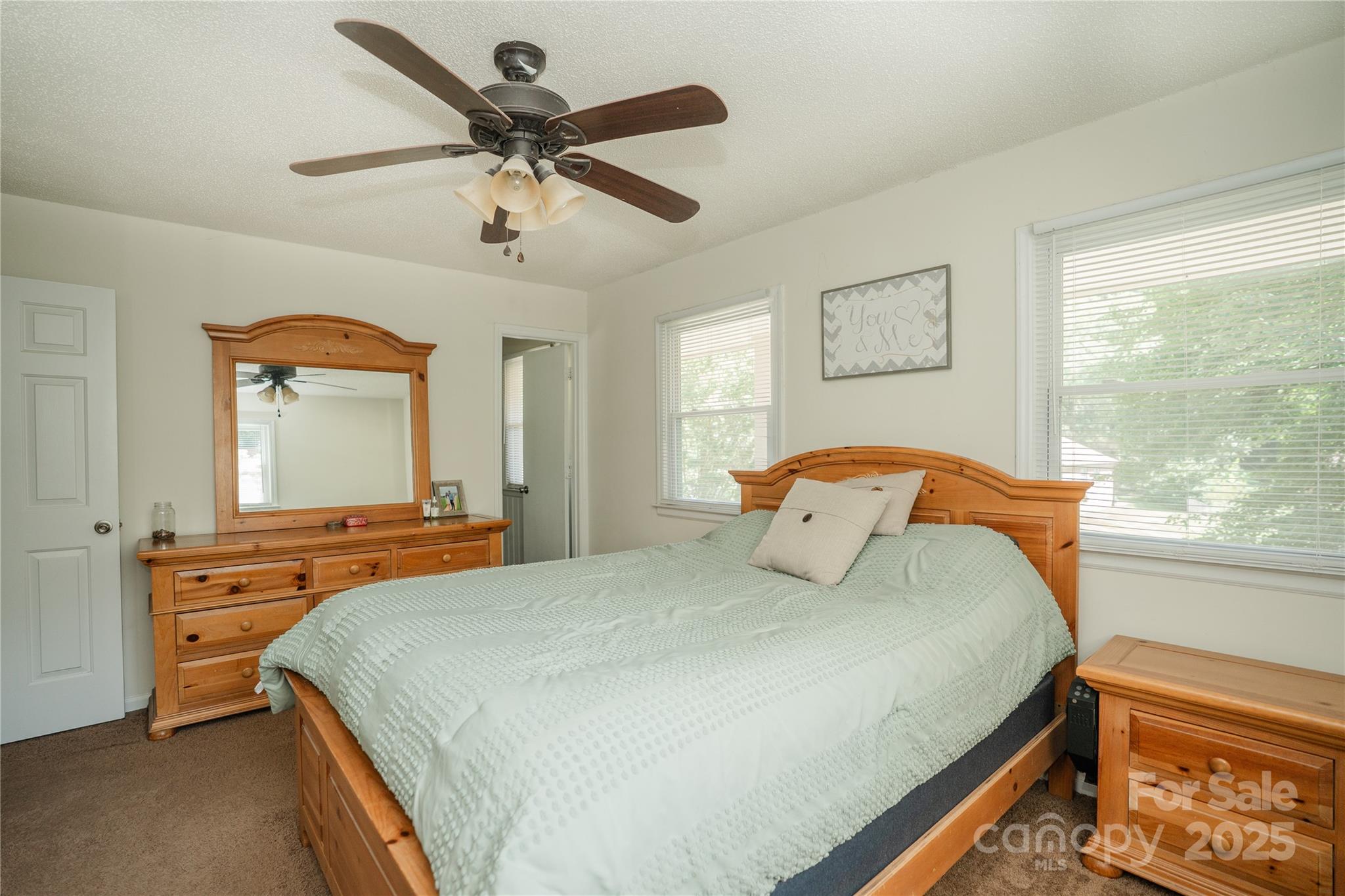 427 Willow Road Salisbury, NC 28147 - Photo 19 of 32 a bedroom with a bed and a large window