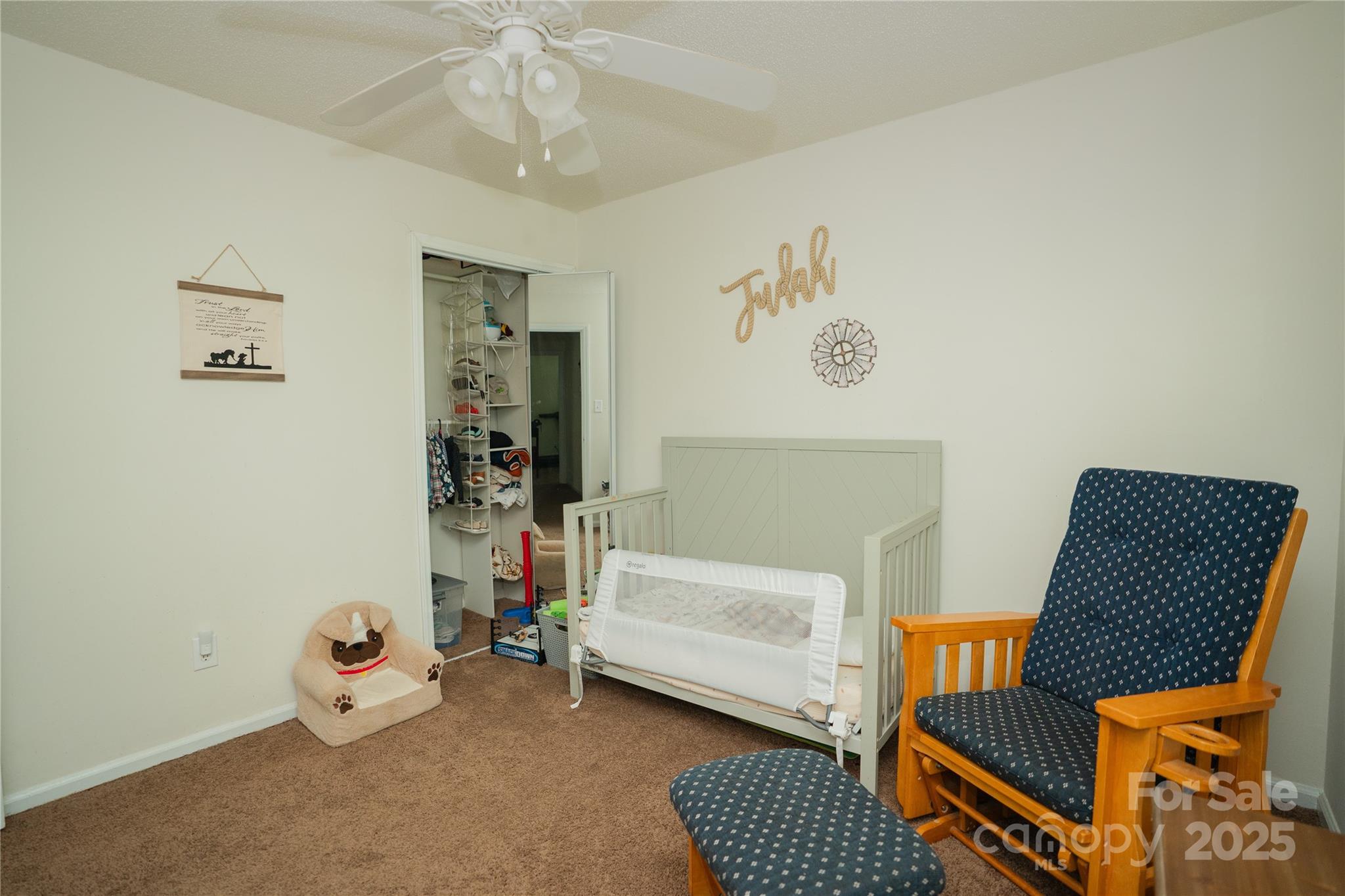 427 Willow Road Salisbury, NC 28147 - Photo 22 of 32 a bedroom with a bed and the couch