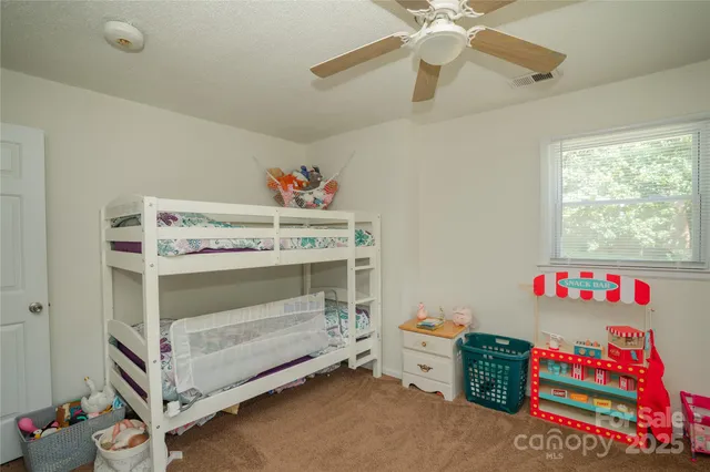 a utility room with a window and toys