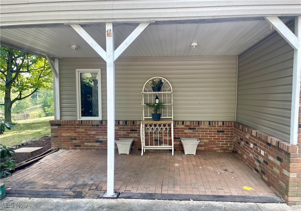 6518 Stonecreek Road Southwest Newcomerstown, OH 43832 - Photo 4 of 42 Covered patio