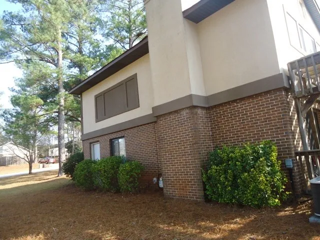 a brick building with a large windows