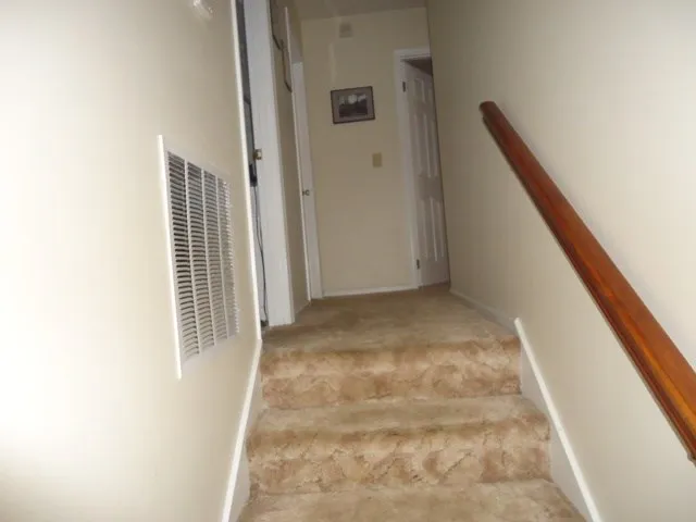 a kitchen with a cabinets and window