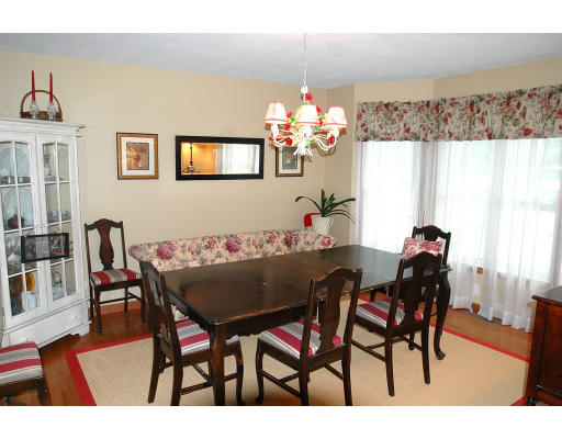 23 Hathaway Road Westhampton, MA 01027 - Photo 5 of 12 a view of a dining room with furniture and chandelier