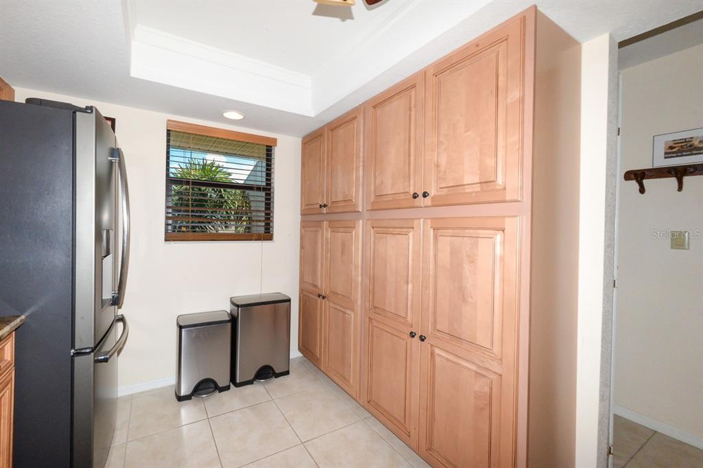 335 Coldeway Drive, Unit F21 Punta Gorda, FL 33950 - Photo 6 of 45 a view of a kitchen with furniture and a window