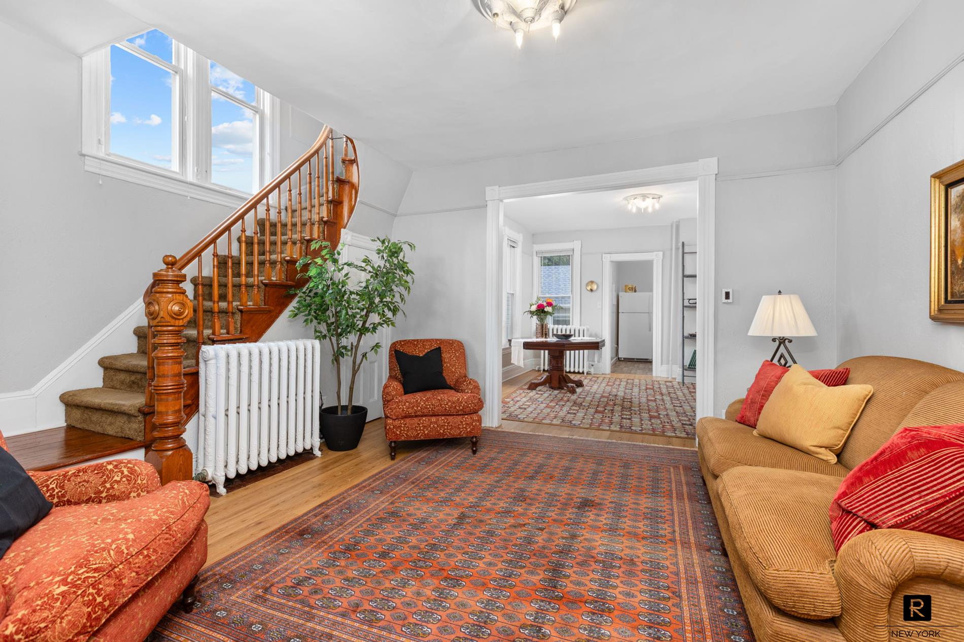 111 Rochelle Street Bronx, NY 10464 - Photo 15 of 28 a living room with furniture or stairs and a couch