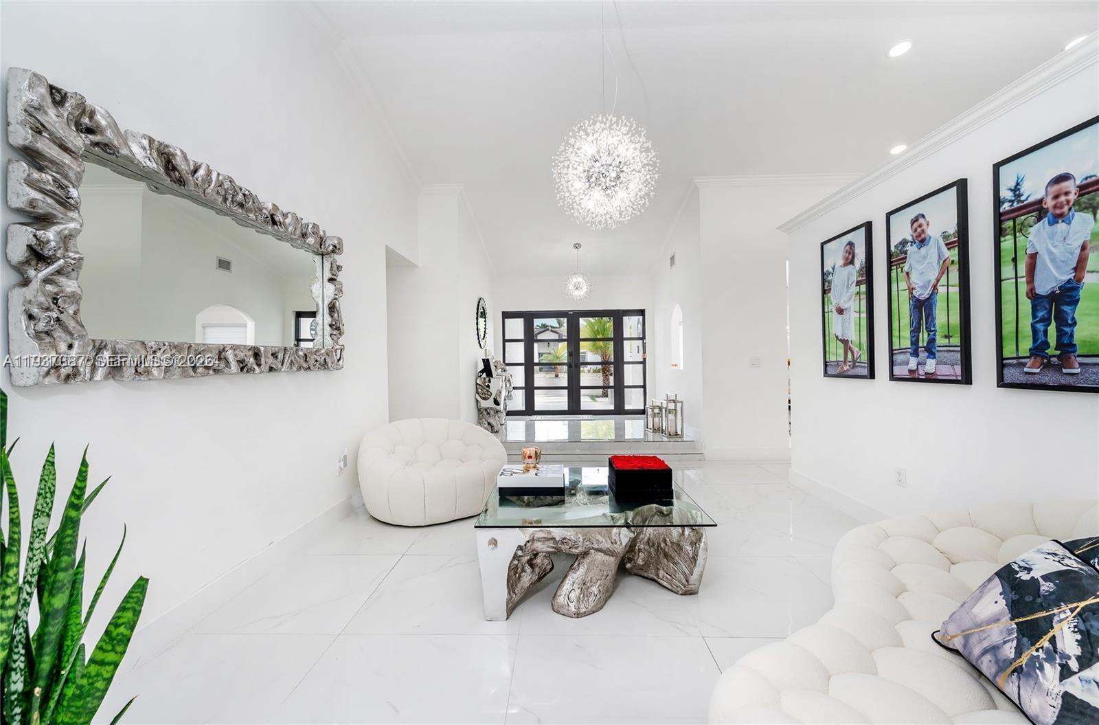 9701 Southwest 56th Terrace Miami, FL 33173 - Photo 13 of 48 a room with furniture and potted plant