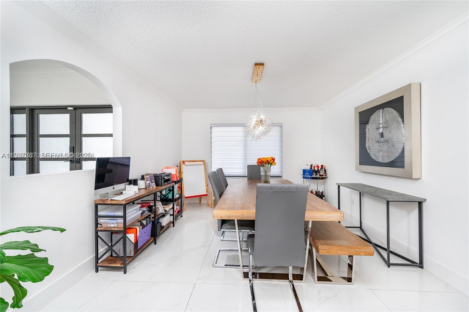9701 Southwest 56th Terrace Miami, FL 33173 - Photo 15 of 48 a view of a workspace with furniture