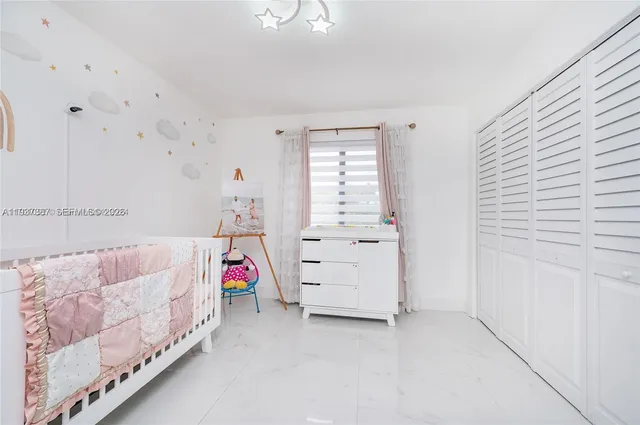 an aerial view of house with yard swimming pool and outdoor seating