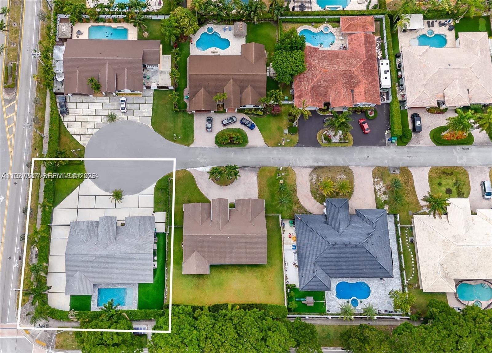 9701 Southwest 56th Terrace Miami, FL 33173 - Photo 37 of 48 an aerial view of house with yard swimming pool and outdoor seating