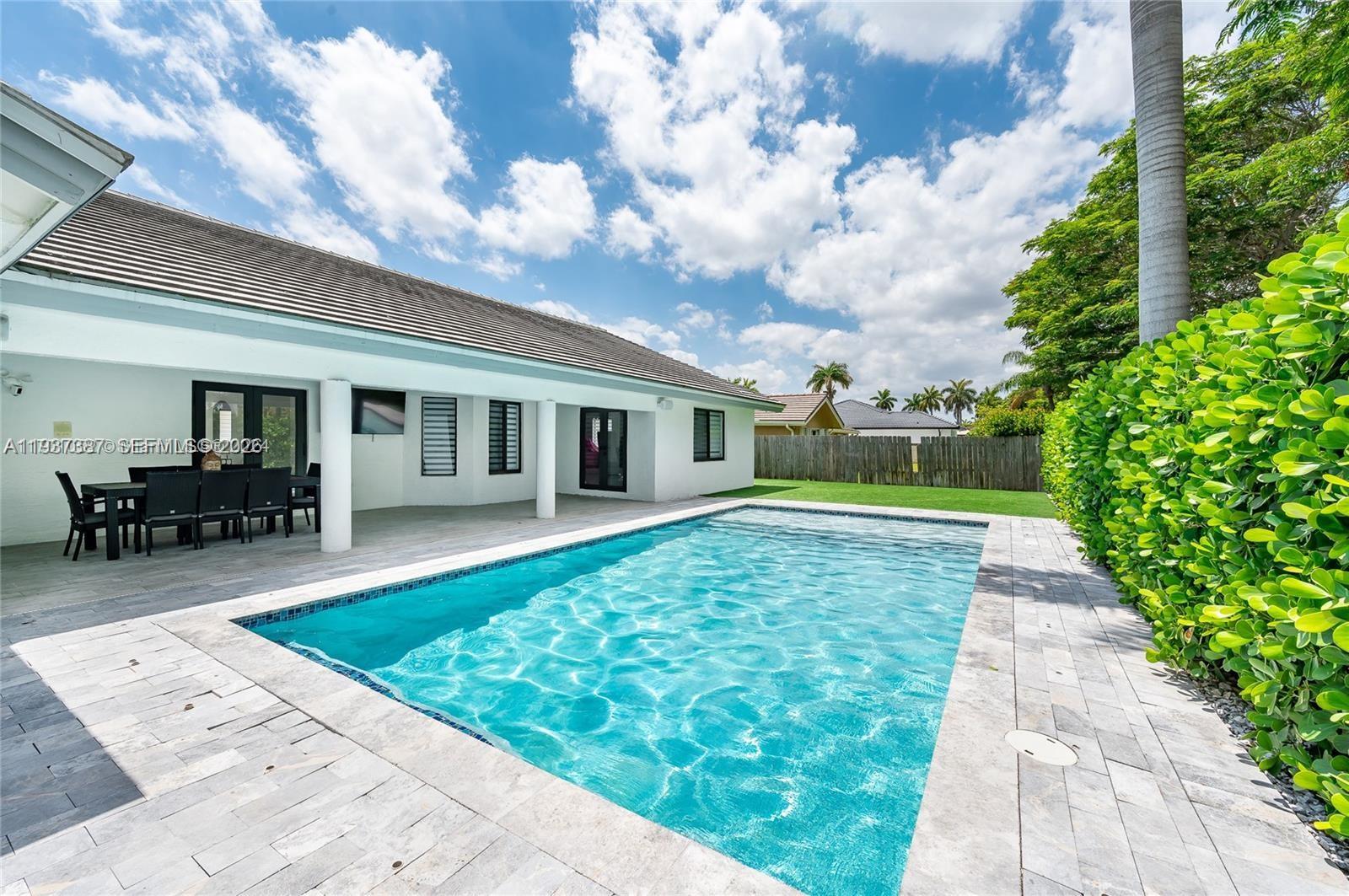 9701 Southwest 56th Terrace Miami, FL 33173 - Photo 41 of 48 a view of house with entertaining space