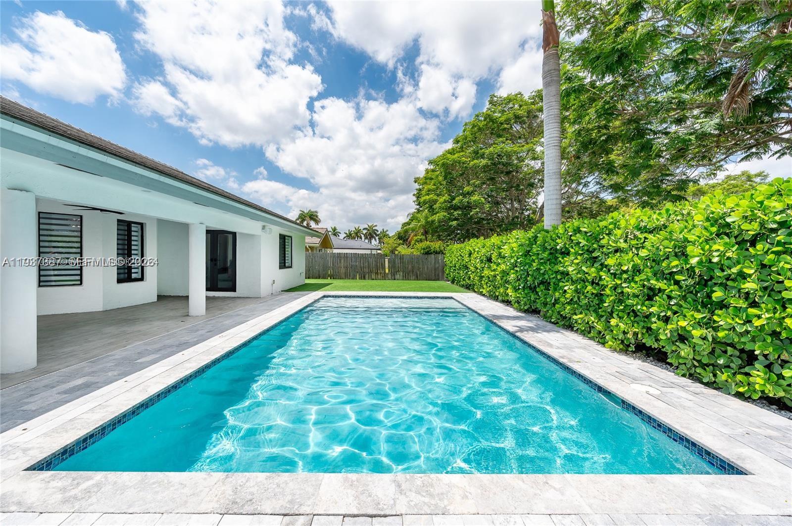 9701 Southwest 56th Terrace Miami, FL 33173 - Photo 42 of 48 a view of backyard with green space