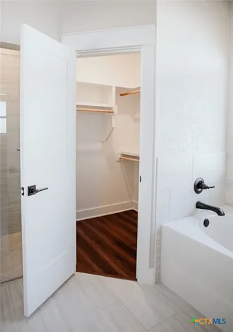 a bathroom with a bathtub