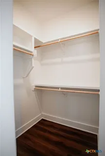 a view of small space with racks on the wall