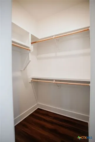 a view of small space with racks on the wall