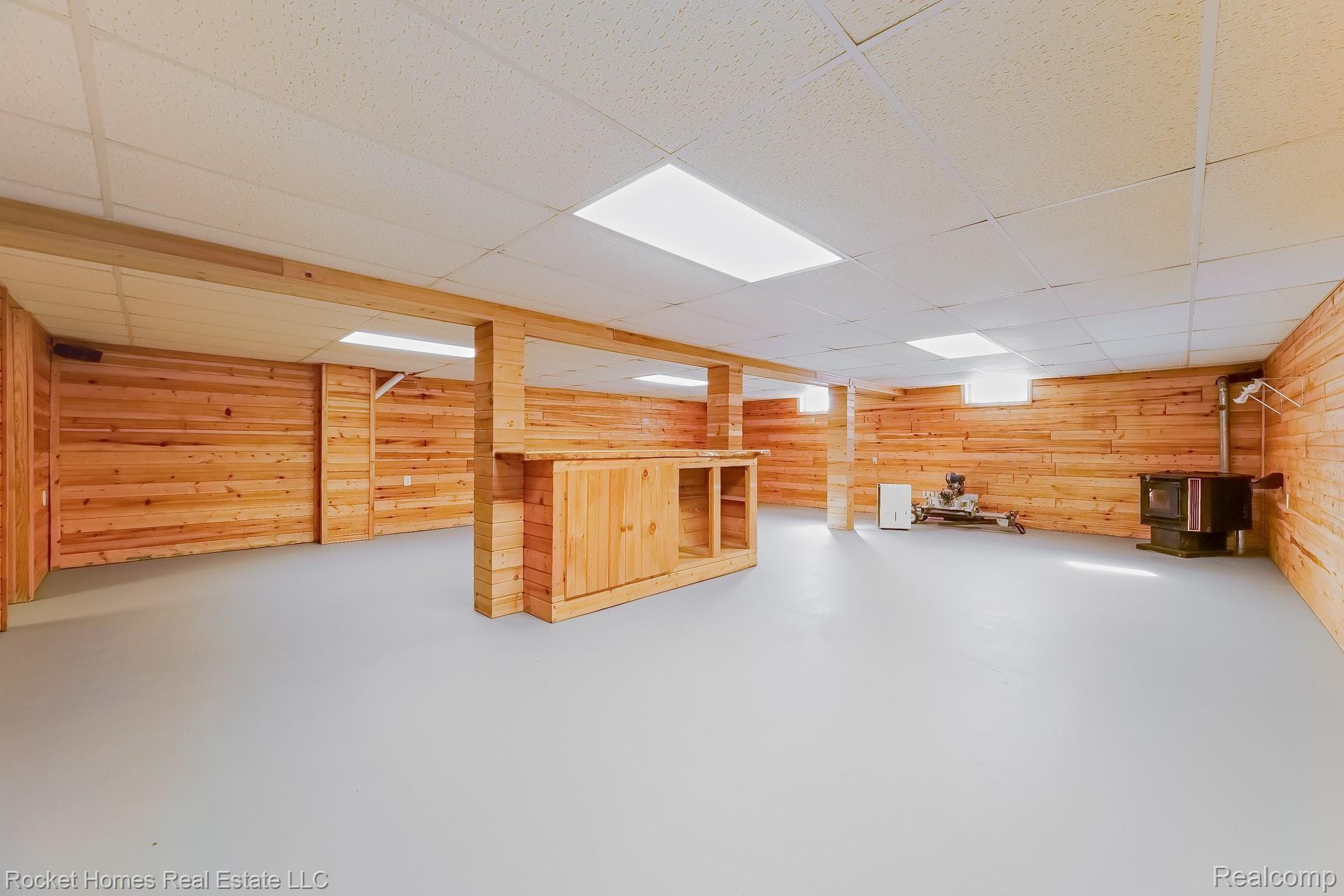 12792 Budd Road Burt, MI 48417 - Photo 33 of 42 032-photo-finished-basement-8986898.jpg