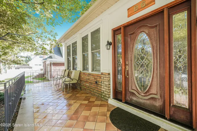 a view of living room filled with furniture