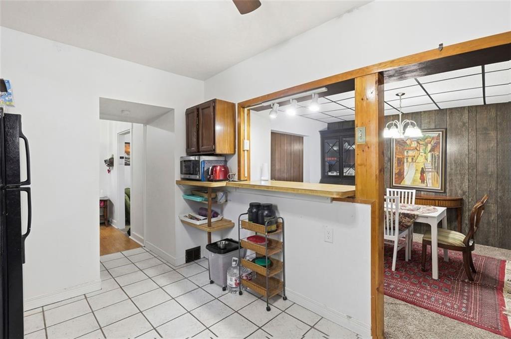 238 Provost Road Pittsburgh, PA 15227 - Photo 15 of 34 a view of kitchen with furniture and refrigerator