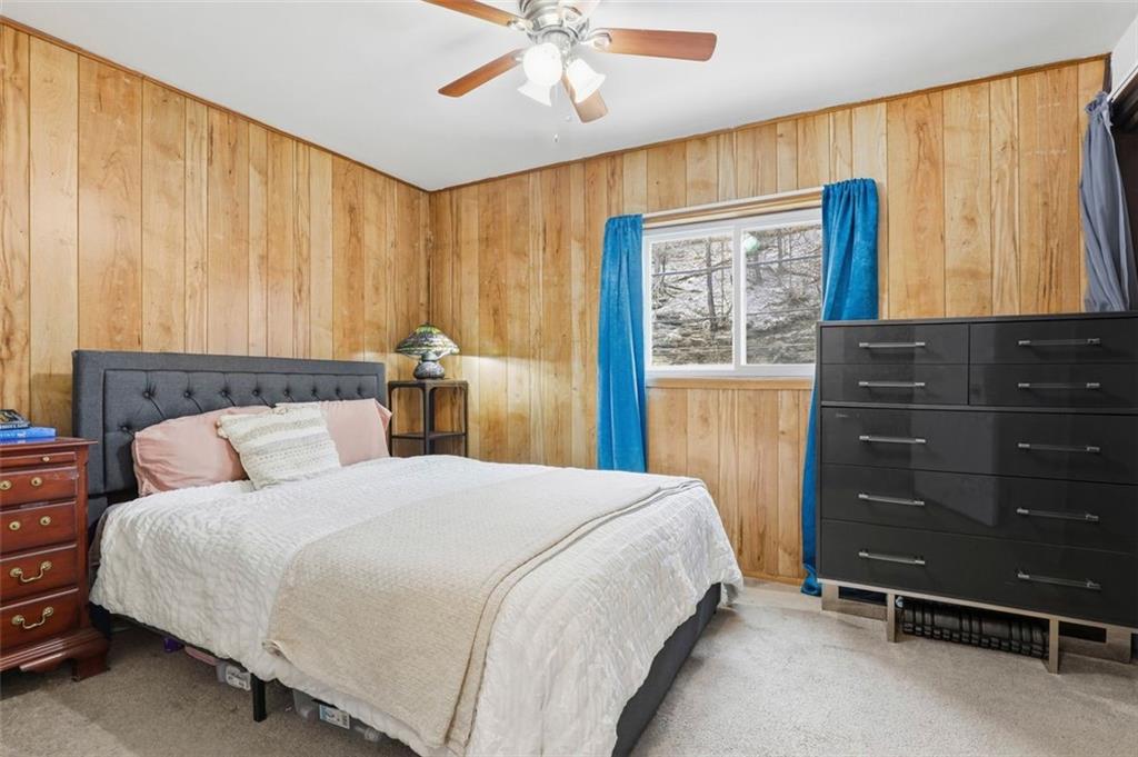 238 Provost Road Pittsburgh, PA 15227 - Photo 17 of 34 a bedroom with a bed and a dresser