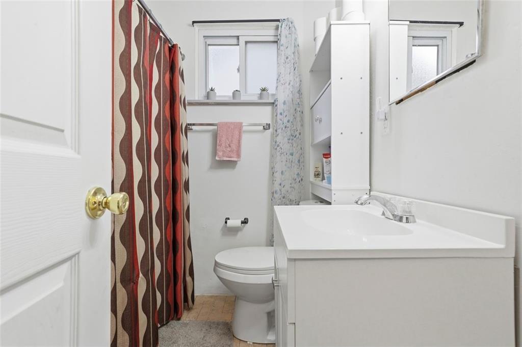 238 Provost Road Pittsburgh, PA 15227 - Photo 21 of 34 a bathroom with a sink a toilet and a mirror