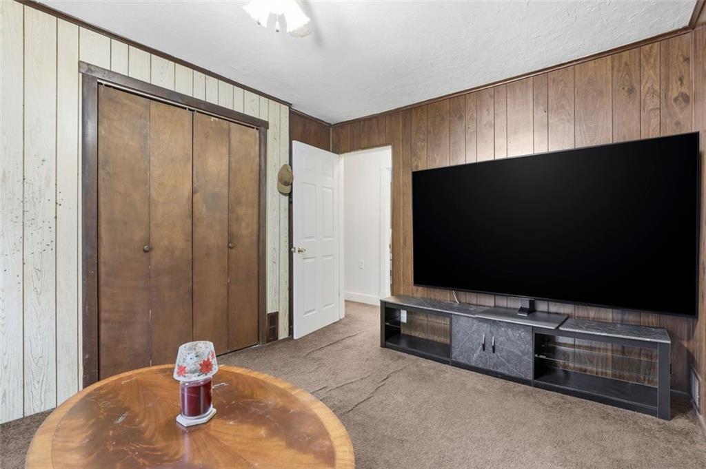 238 Provost Road Pittsburgh, PA 15227 - Photo 23 of 34 a living room with flat screen tv and outdoor view