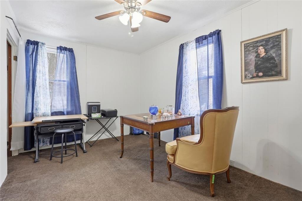 238 Provost Road Pittsburgh, PA 15227 - Photo 24 of 34 a living room with furniture and a window