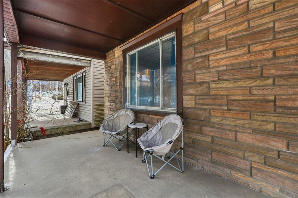 238 Provost Road Pittsburgh, PA 15227 - Photo 4 of 34 a balcony with couple of chairs and a couch