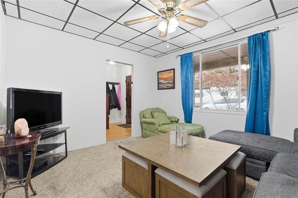 238 Provost Road Pittsburgh, PA 15227 - Photo 9 of 34 a view of a workspace with furniture and a window