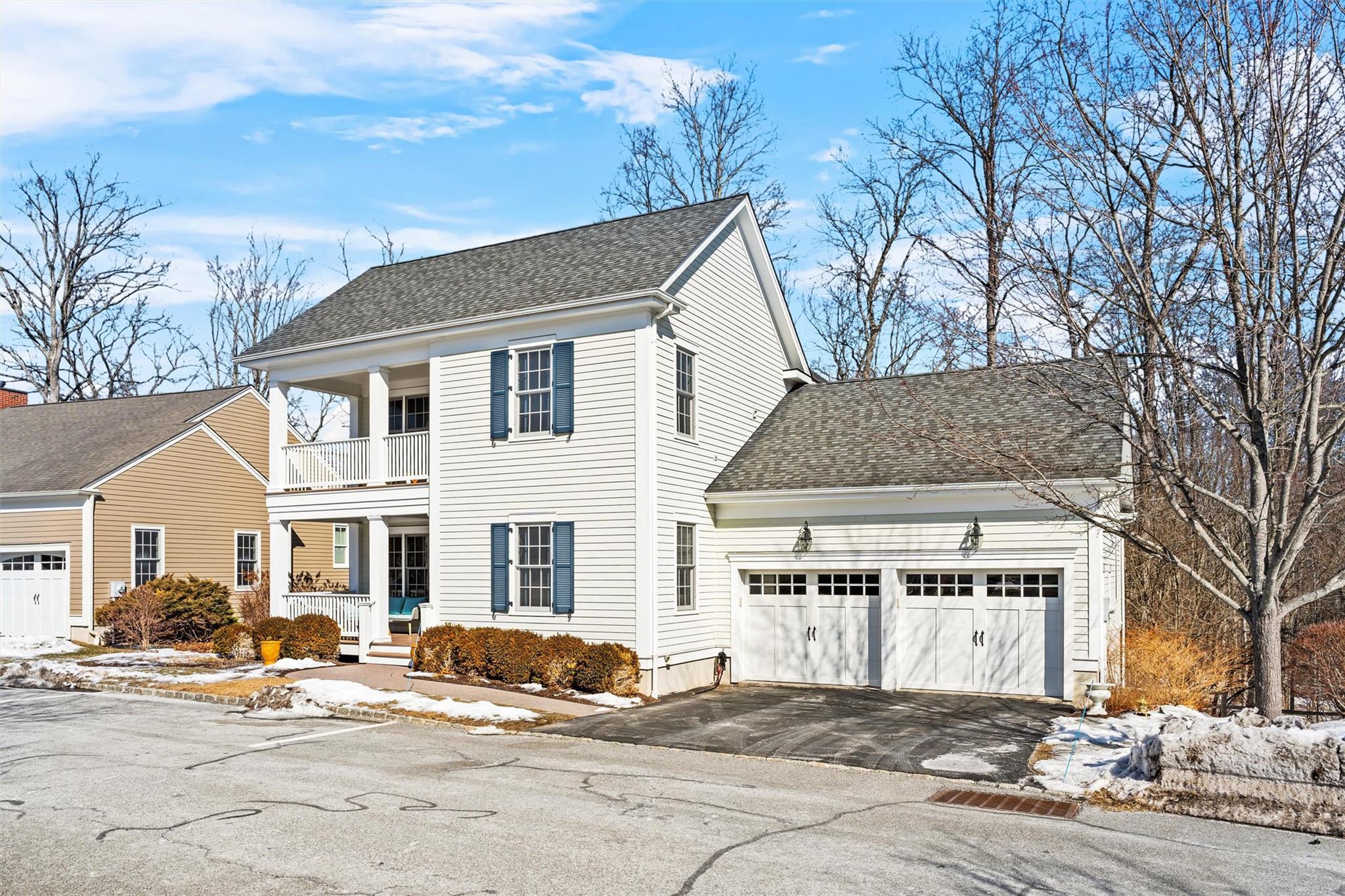 Front View of property with garage and double porch - backing up to the conservation area.
