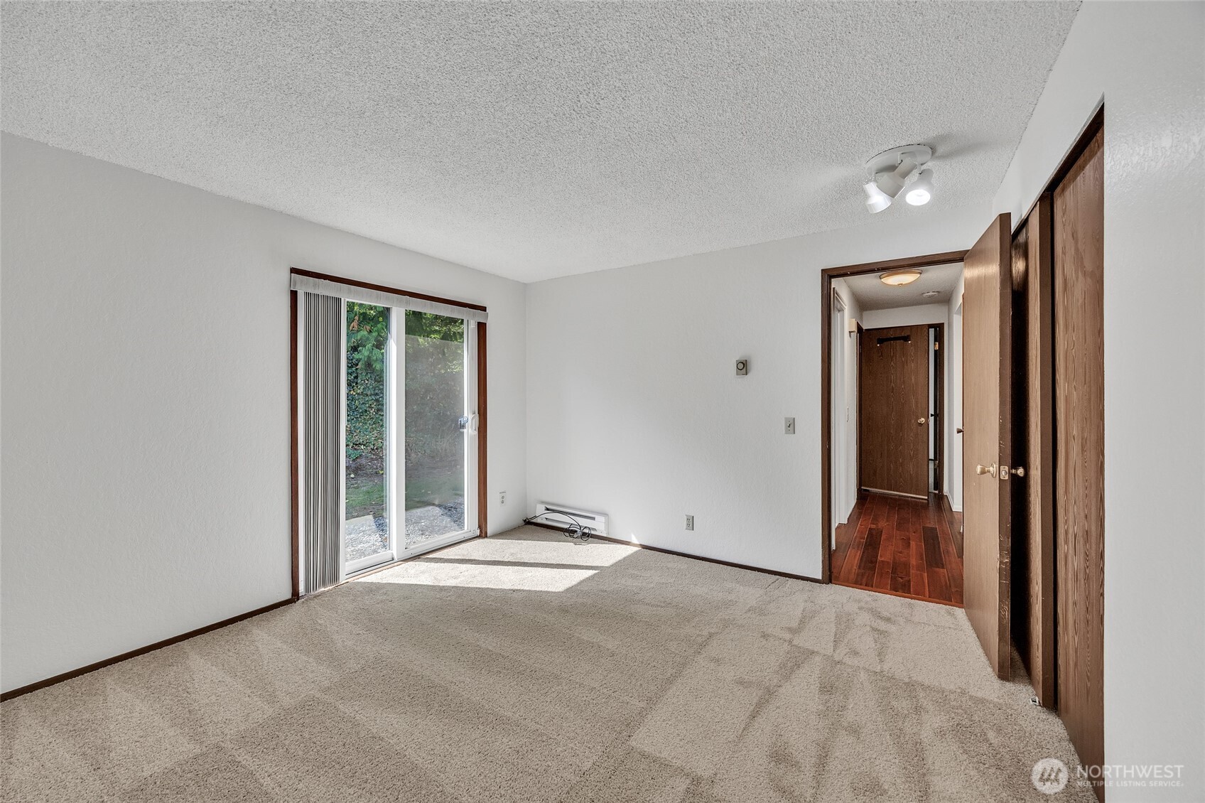 7914 242nd Street Southwest Edmonds, WA 98026 - Photo 12 of 38 a view of an empty room and window