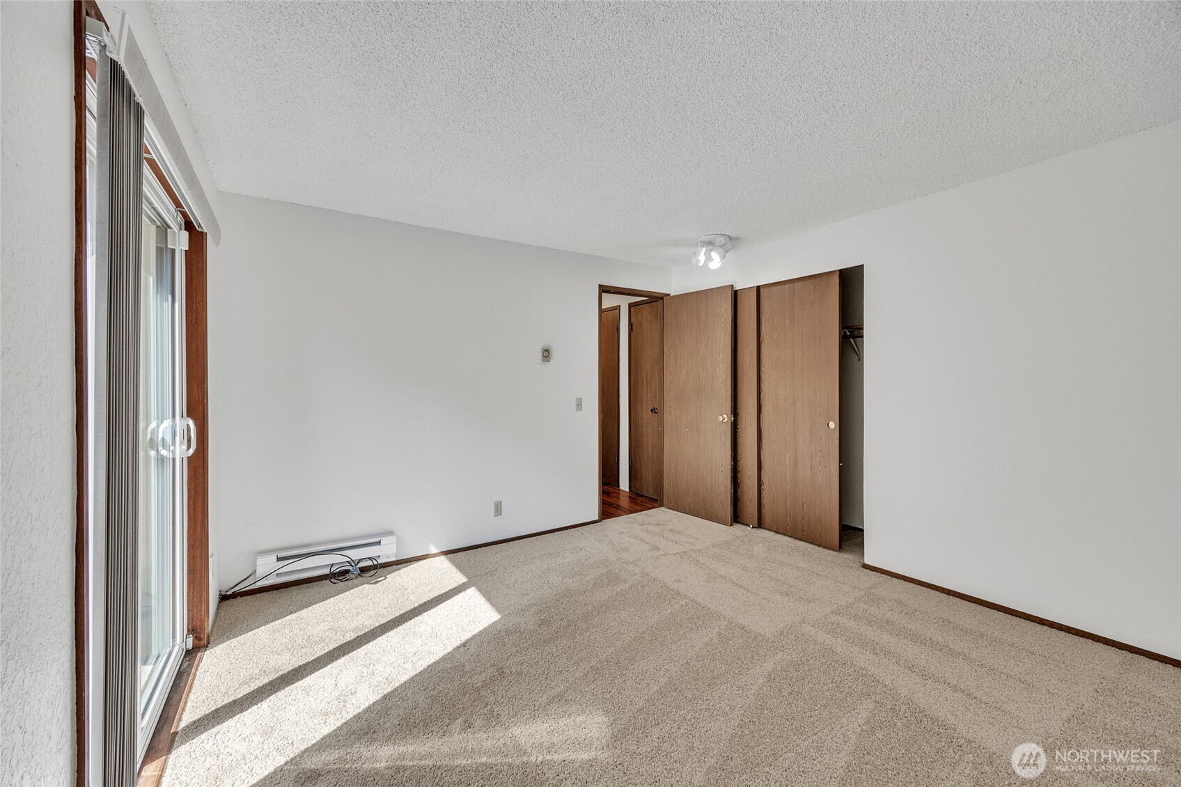 7914 242nd Street Southwest Edmonds, WA 98026 - Photo 13 of 38 a view of a livingroom with an empty space and a window