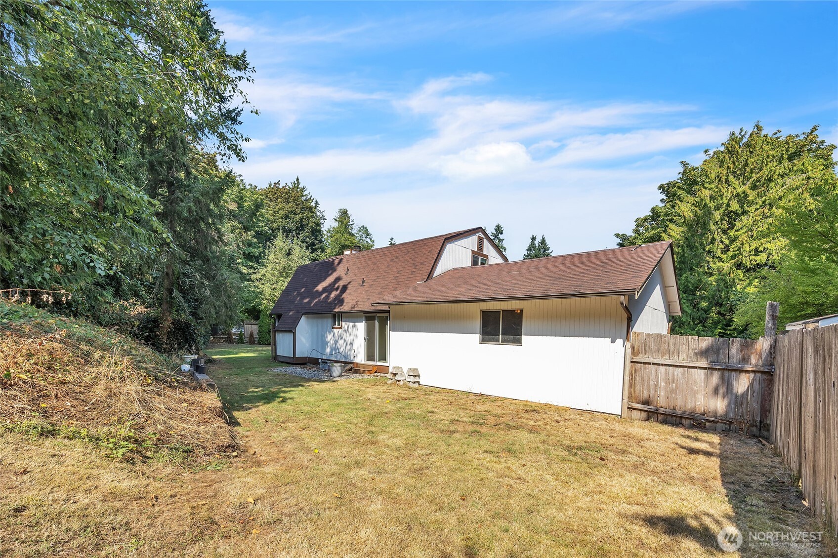 7914 242nd Street Southwest Edmonds, WA 98026 - Photo 28 of 38 a front view of a house with a yard