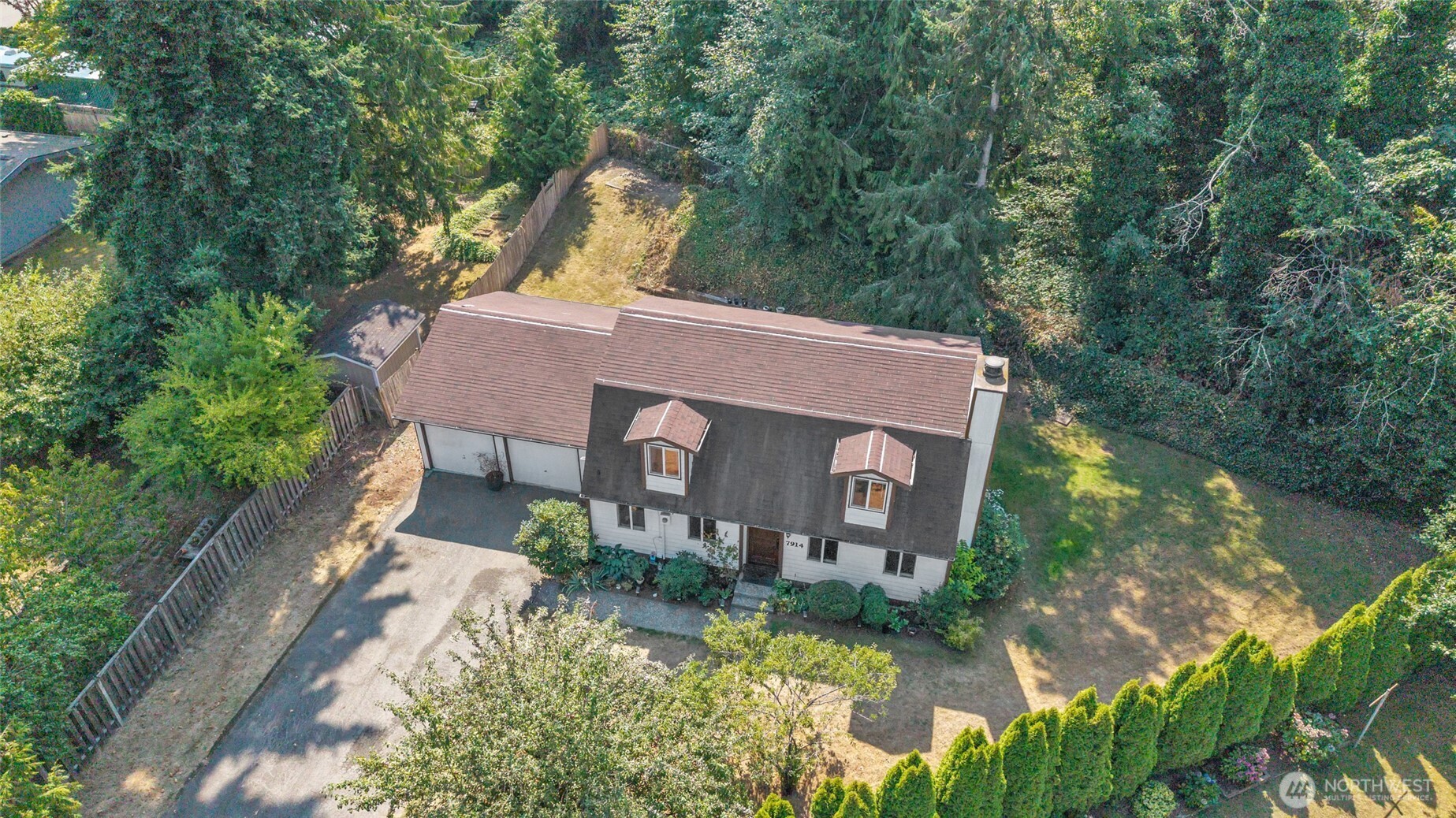 7914 242nd Street Southwest Edmonds, WA 98026 - Photo 31 of 38 front view of a house with a yard