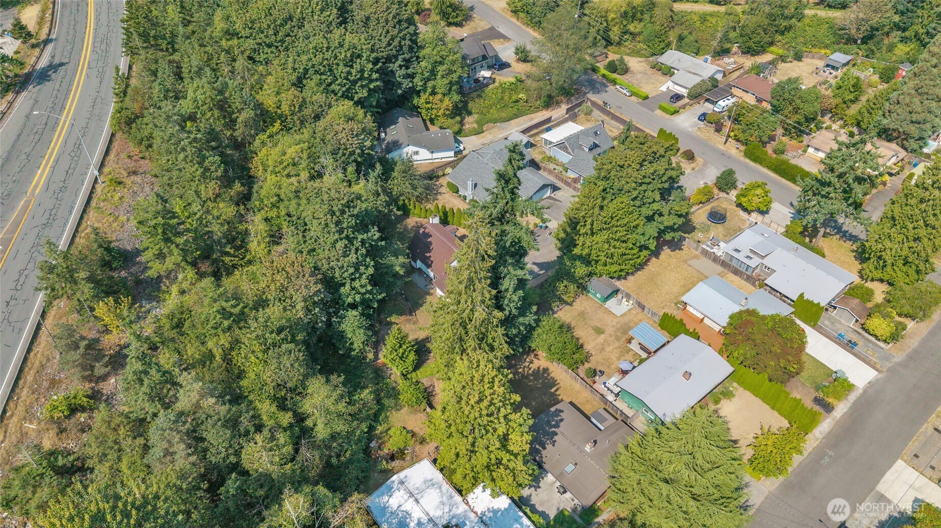 7914 242nd Street Southwest Edmonds, WA 98026 - Photo 33 of 38 an aerial view of a house with a yard