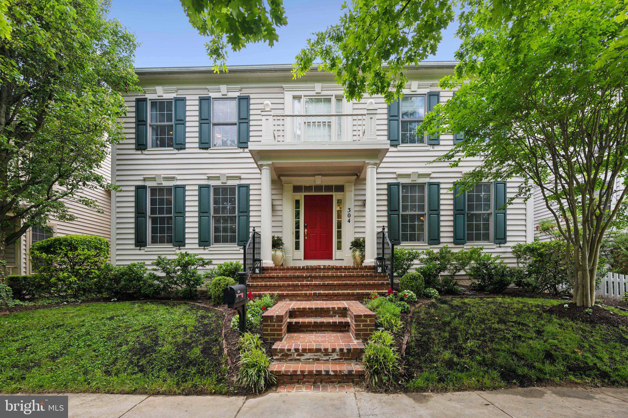 304 Thompson Dairy Way Rockville, MD 20850 - Photo 1 of 42 front view of a house with a yard