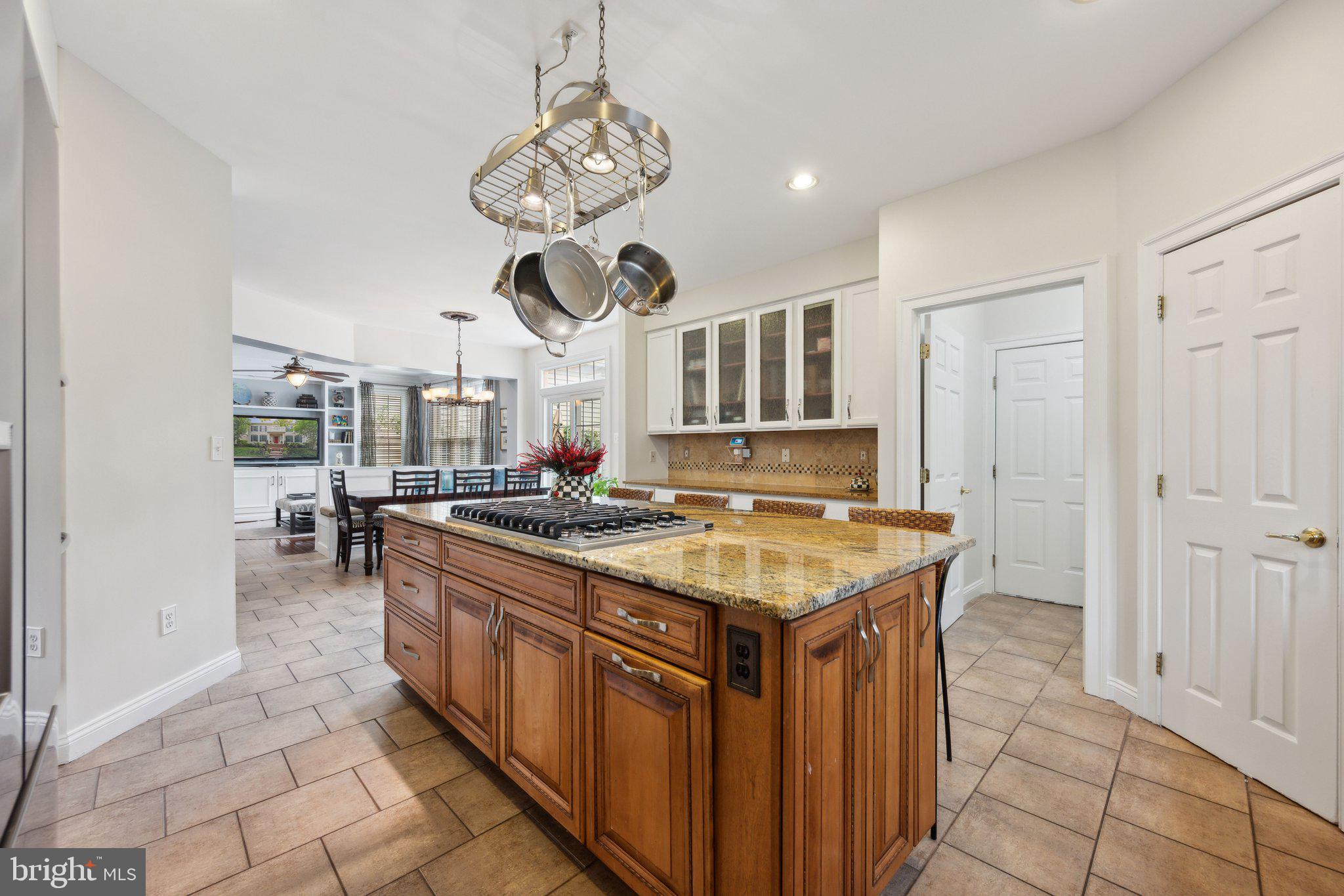 304 Thompson Dairy Way Rockville, MD 20850 - Photo 14 of 42 a kitchen with a counter space cabinets and stainless steel appliances